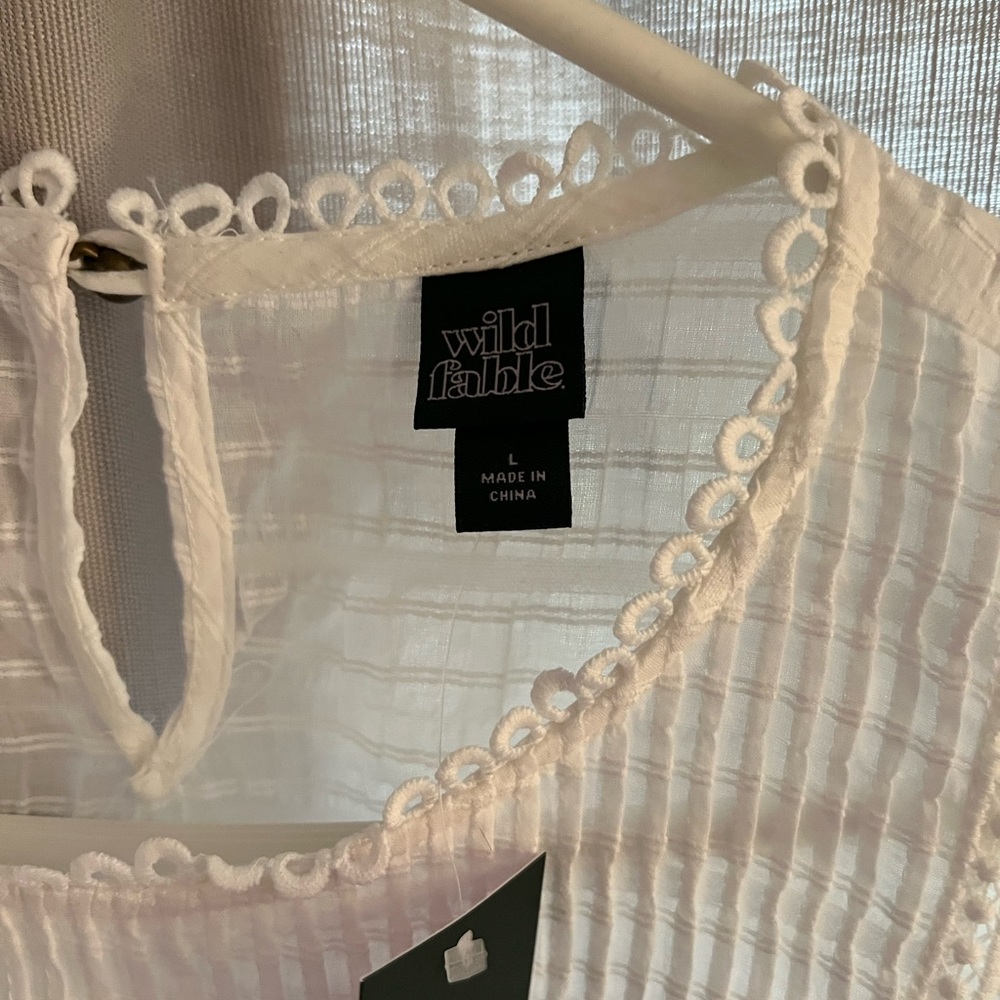 Wild fable from Target. NWT white dress size L flutter sleeve with elastic waist